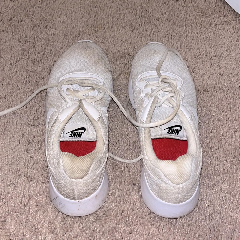 Nike tennis shoes, well worn. Still have lots of life left!